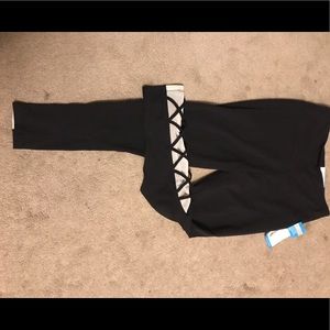 NWT Black leggings with criss cross mesh design